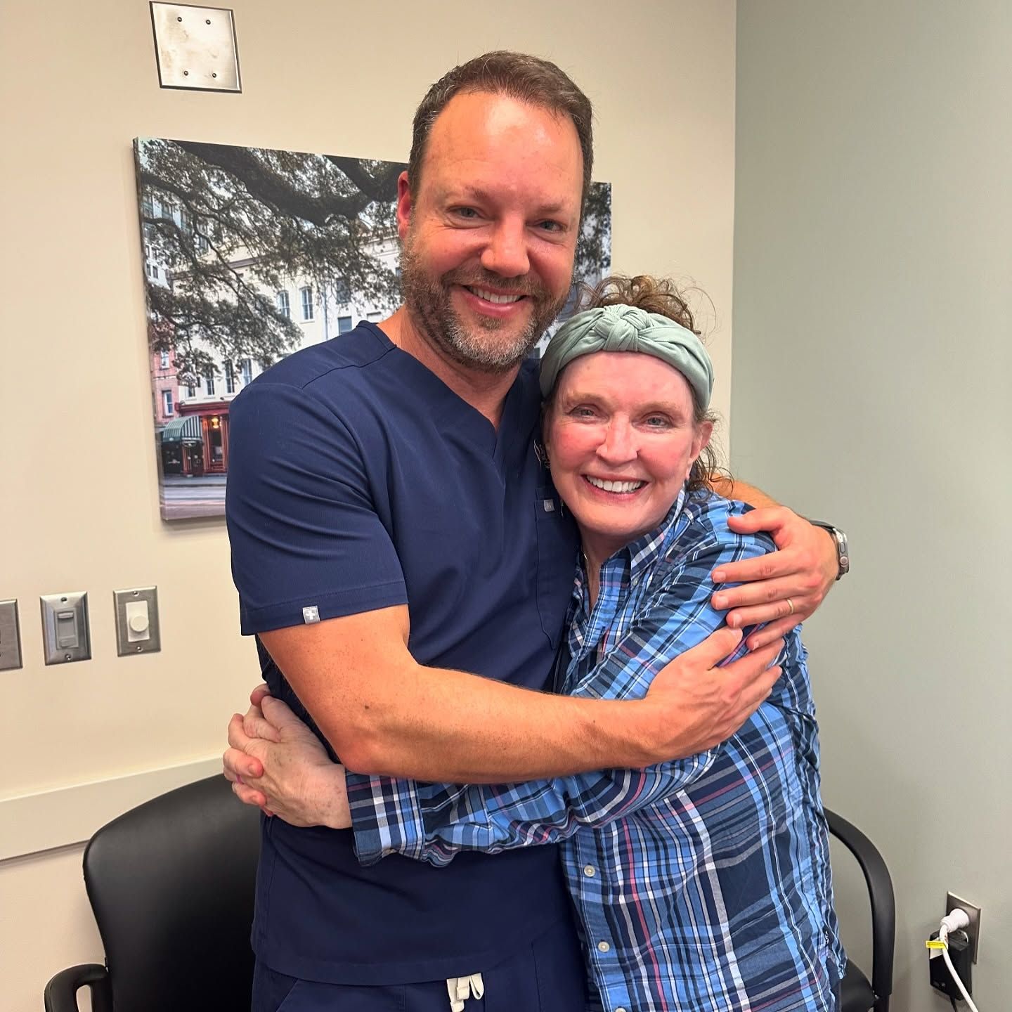 Dr. Minton - savannah facial plastic surgeon with patient